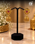 Gold Tone Temple Floral Jhumka Earrings with Ruby Stone and Golden Bead Drops