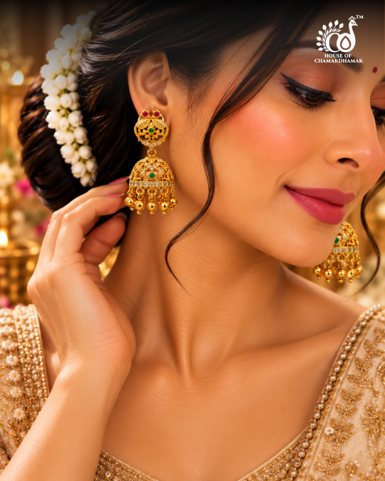 Gold Tone Temple Peacock Jhumka Earrings with Ruby, Green and Kundan Stones and Golden Bead Drops