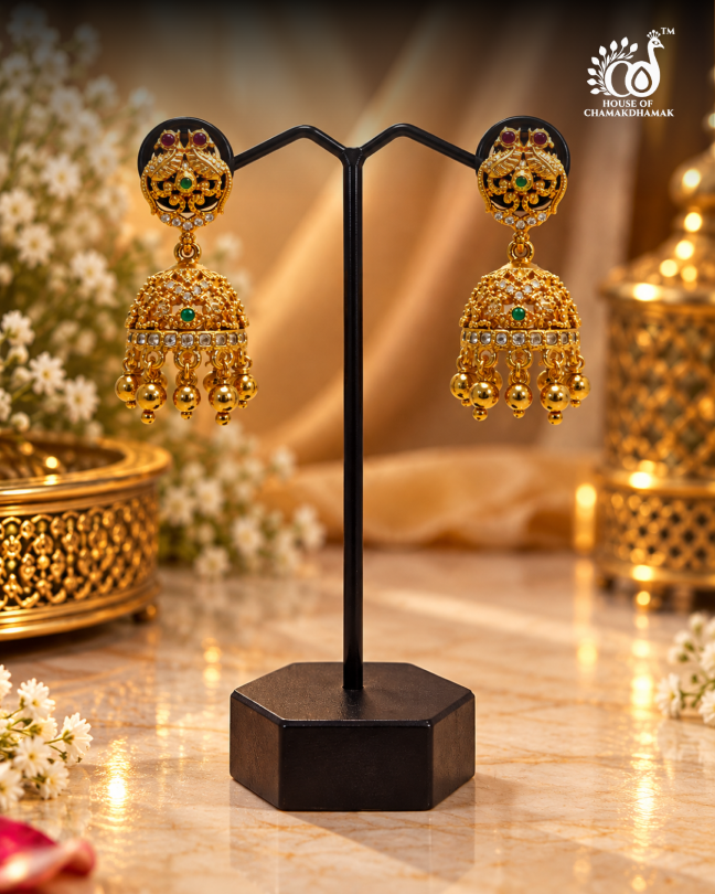 Gold Tone Temple Peacock Jhumka Earrings with Ruby, Green and Kundan Stones and Golden Bead Drops