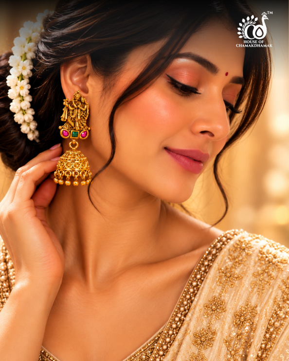 Antique Gold Tone Temple Radha Krishna Jhumka Earrings with Ruby and Green Stones and Golden Bead Drops