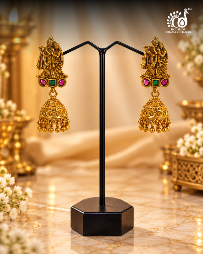 Antique Gold Tone Temple Radha Krishna Jhumka Earrings with Ruby and Green Stones and Golden Bead Drops