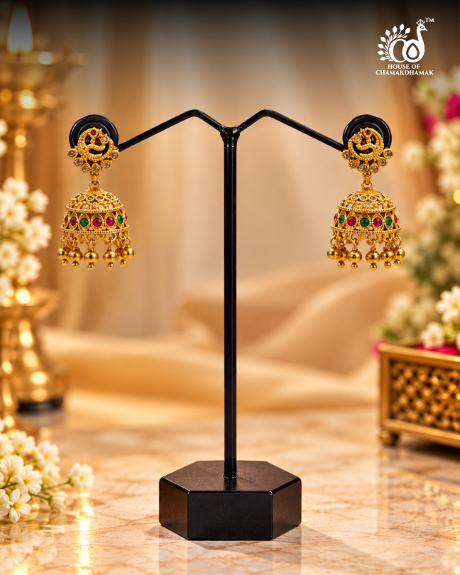 Gold Tone Temple Peacock Jhumka Earrings with Ruby and Green Stone Band and Golden Bead Drops