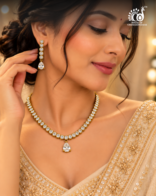 Gold Tone AD Necklace Set with Pear Drop Pendant and Matching Drop Earrings